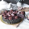 Shop Decadent Chocolate Truffle Cake And Red Roses Bouquet Combo