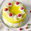 Buy Pineapple Cake with Cherry Toppings (Half Kg)