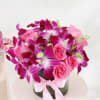 Buy Purple Orchids & Pink Roses In Round Vase