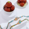 Radiant Peacock Motif Rakhi Duo With Gulab Jamun