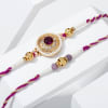 Regal Purple Stone And Pearl Rakhi - Set Of 2
