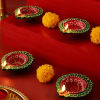 Buy Set of 4 Clay Diya with Maa Laxmi & Lord Ganesha Idols