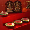 Set of 4 Clay Diya with Maa Laxmi & Lord Ganesha Idols Online